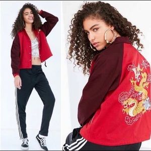 Red jacket with embroidered dragon